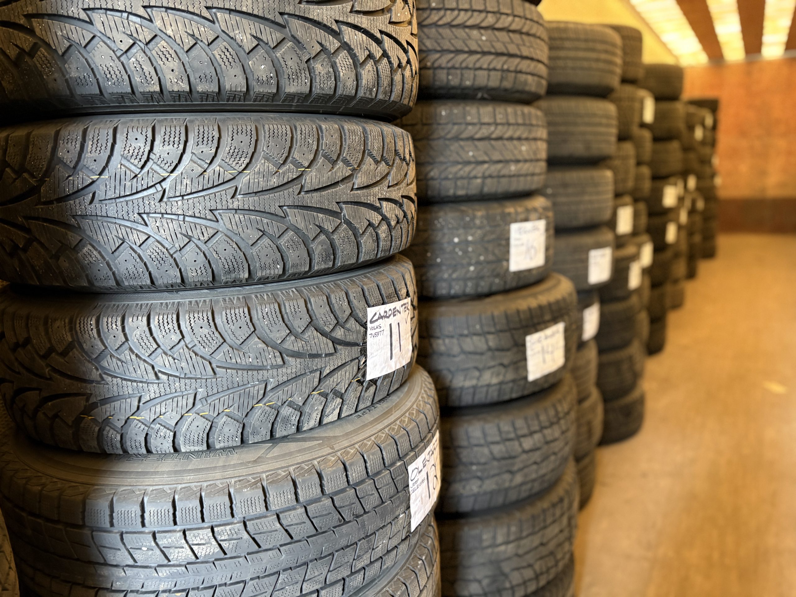 IMG_5750 Seasonal tire change Barrie — technician mounting tires at Roberts Complete Auto Care