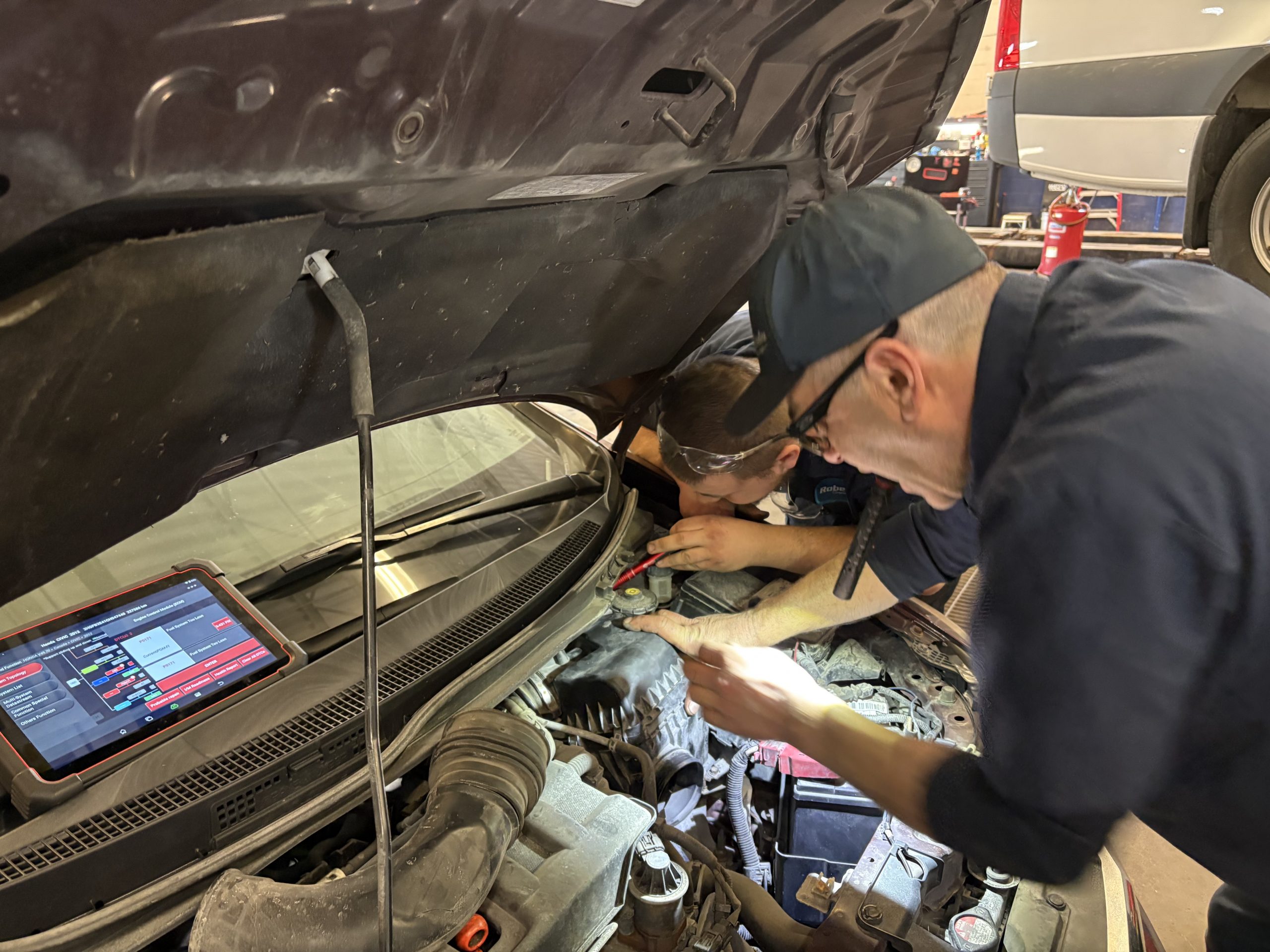 Safety Inspection Barrie - technician performing safety inspection at Roberts Complete Auto Care