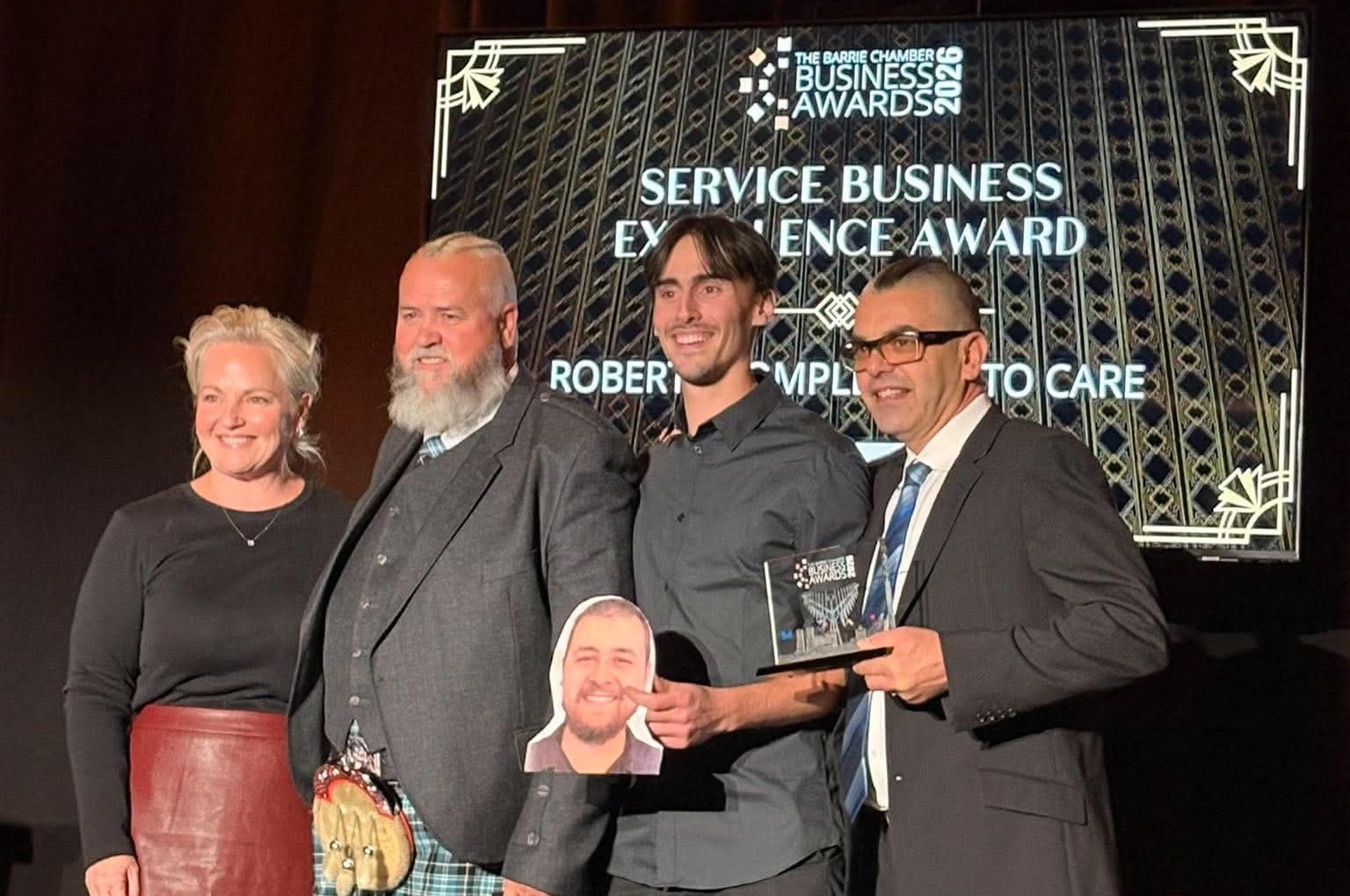 7dff673b2f091e76243519f0b974d547 RCAC Team accepting their Service Business Excellence Award
